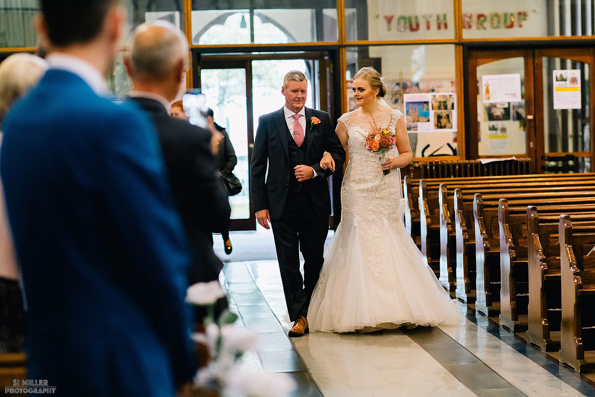 bride walking down the aisle Blessed Sacred Church Liverpool
